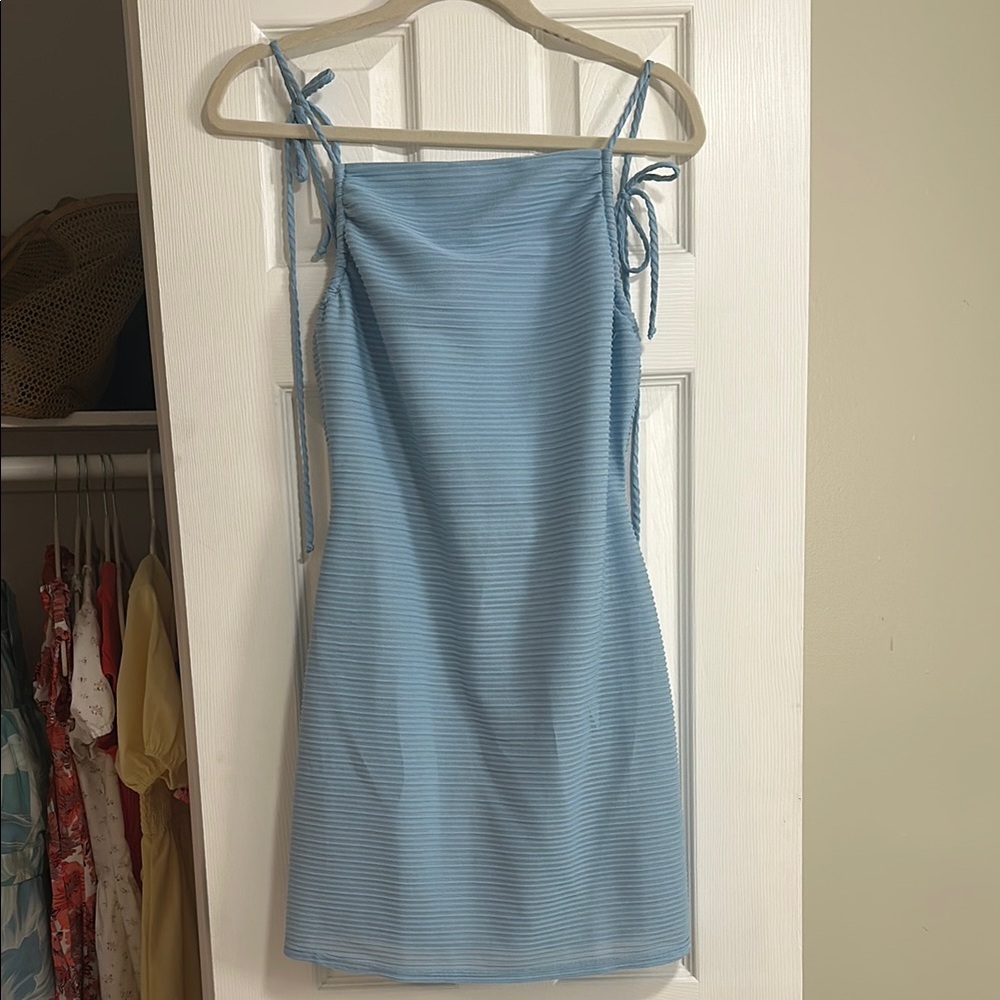 Light blue ribbed mini dress with open back